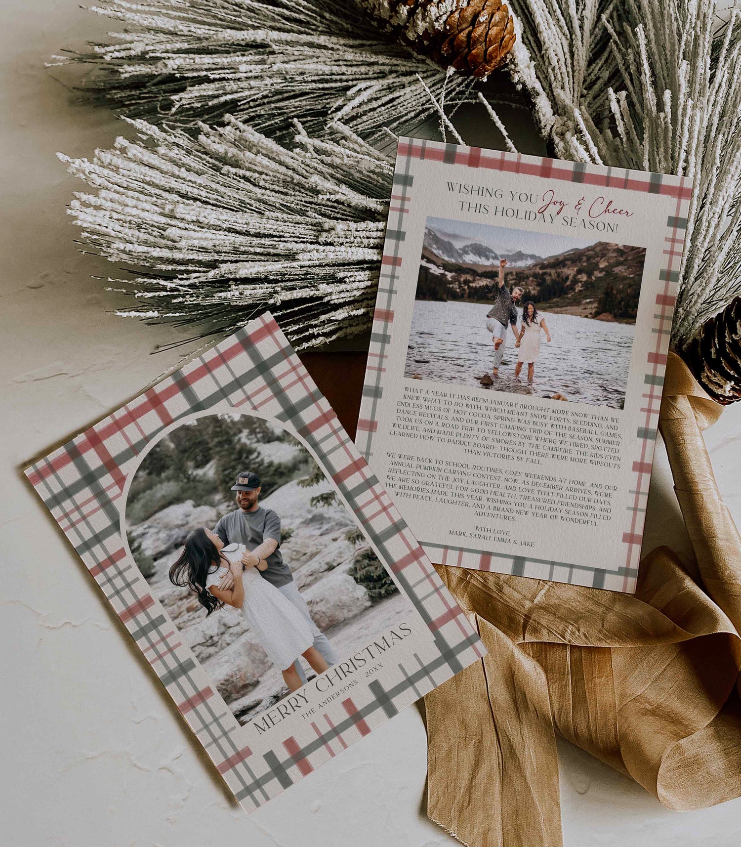 Front and back Christmas cards with plaid borders featuring photos of a couple on a snowy background. Designed by High Peaks Studios LLC