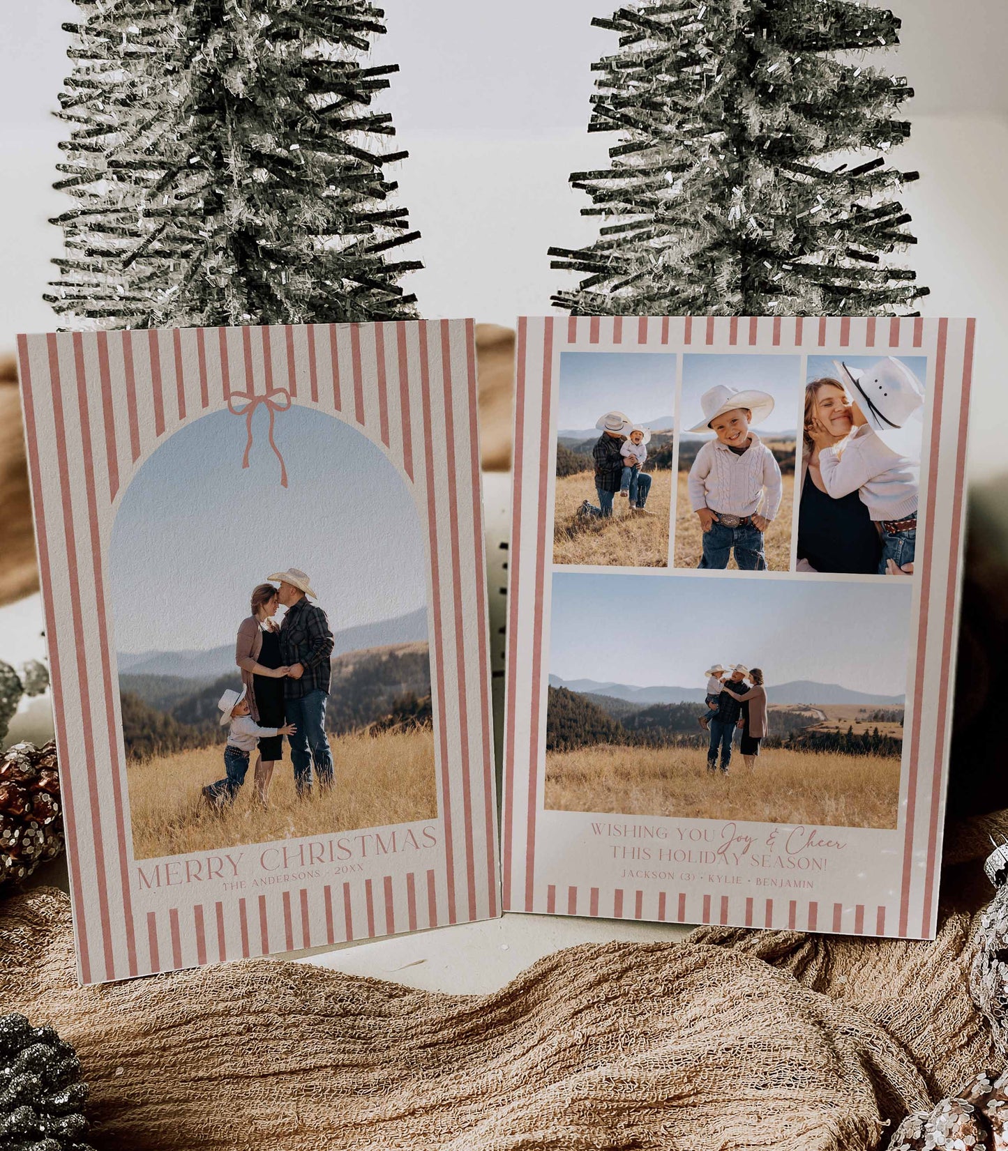 Front and Back Christmas cards with striped borders and family photos on a textured surface with decorative trees.