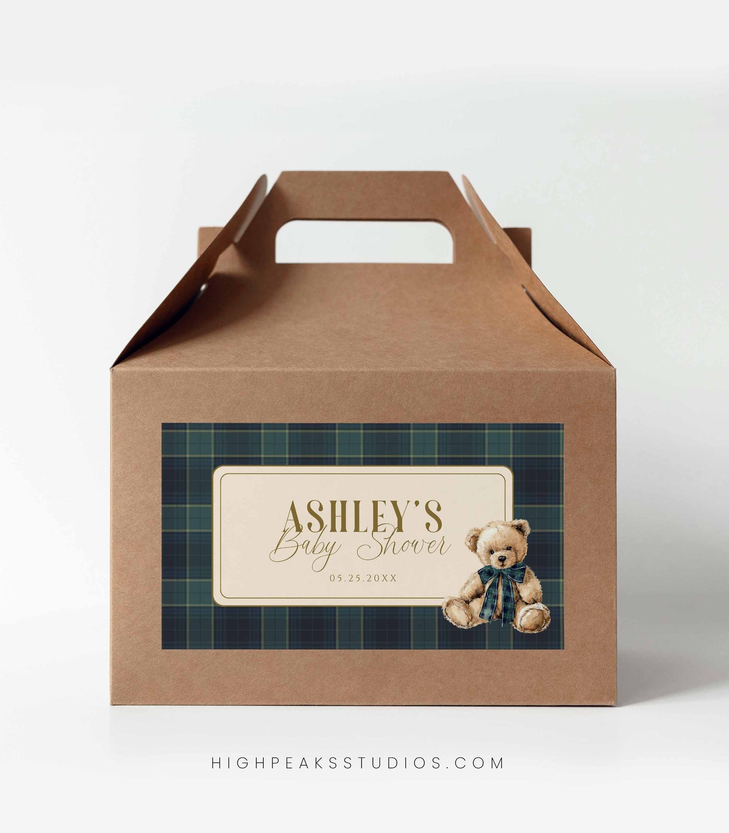 Brown paper gift box with plaid design and teddy bear illustration, featuring a baby shower favor label.