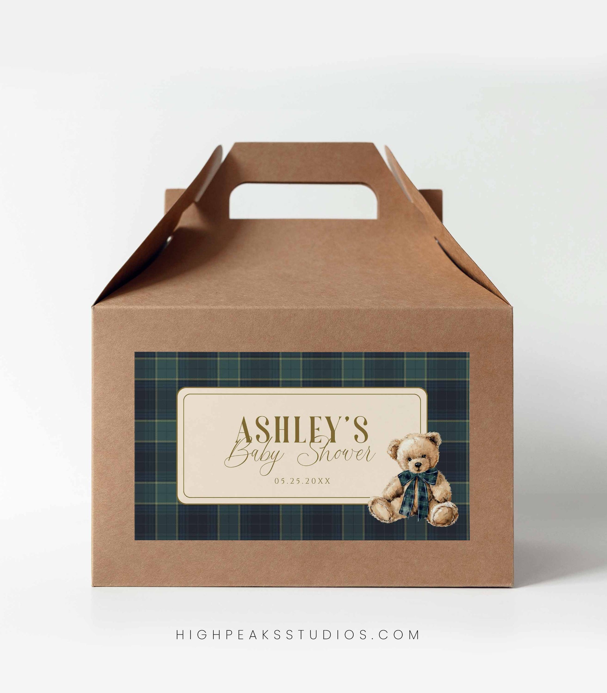 Brown paper gift box with plaid design and teddy bear illustration, featuring a baby shower favor label.