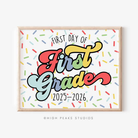 Framed poster with 'First Day of First Grade 2025-2026' text on a white background with colorful confetti. By High Peaks Studios LLC