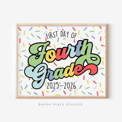 Framed sign with 'First Day of Fourth Grade 2025-2026' text on a colorful confetti background, branded 'High Peaks Studios'.