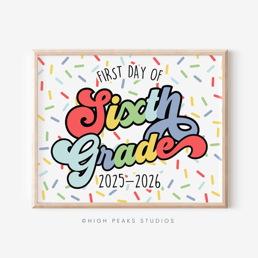 Framed sign with 'First Day of Sixth Grade 2025-2026' text on a white background with colorful confetti pattern.