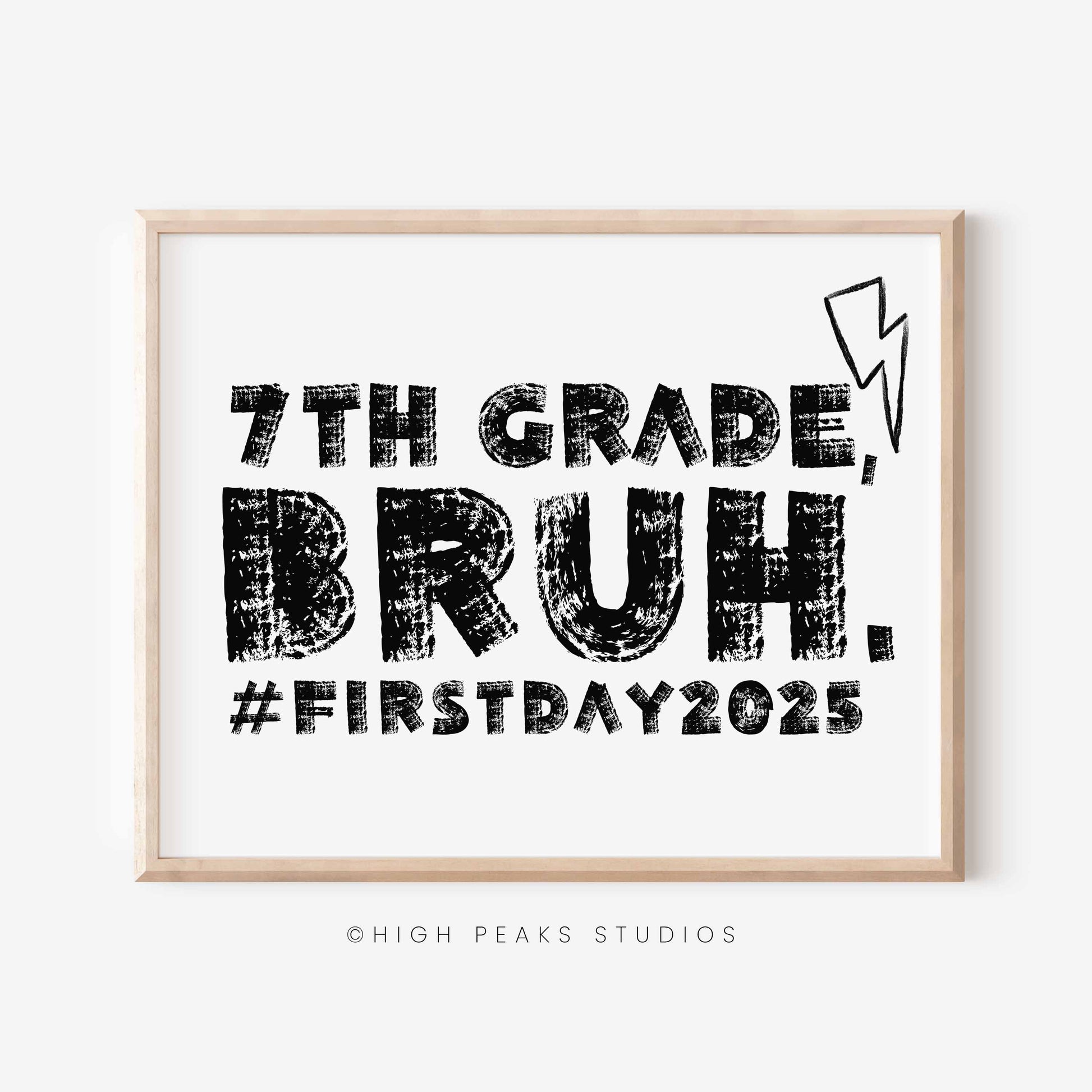 Framed print with '7th Grade, Bruh. #FirstDay2025' text and High Peaks Studios logo.